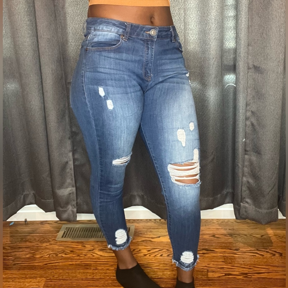 Blue distressed ankle cropped jeans
